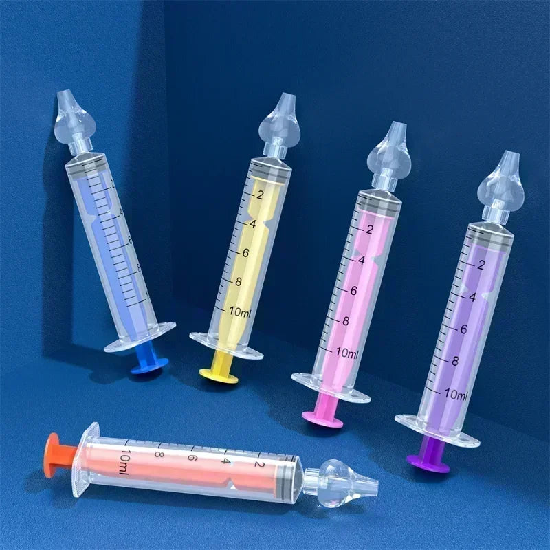 Set of five colorful syringes with different colored plungers on a blue background