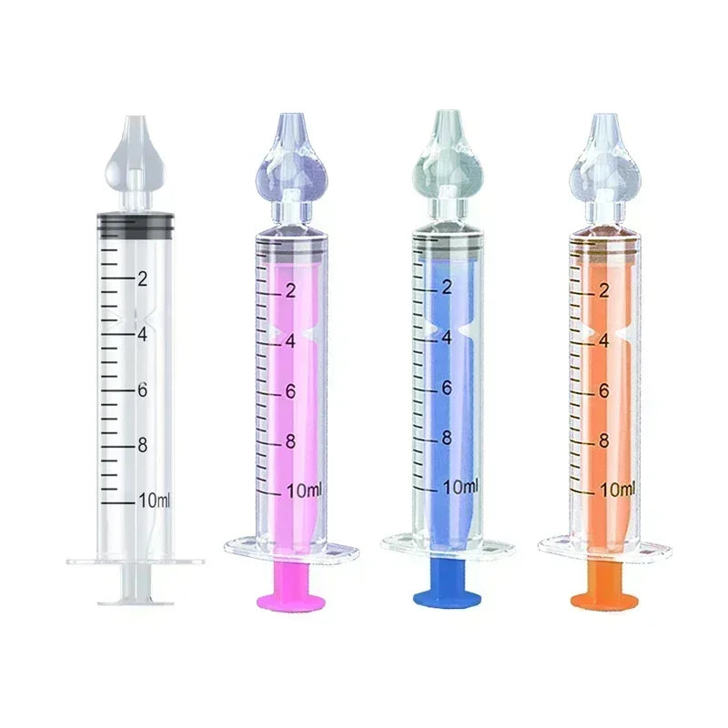 Four syringes with different colored plungers on a white background