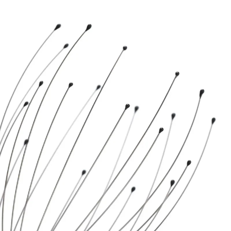 Black hair strands on a white background