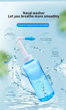 Nasal washer with water splashes on a light blue background