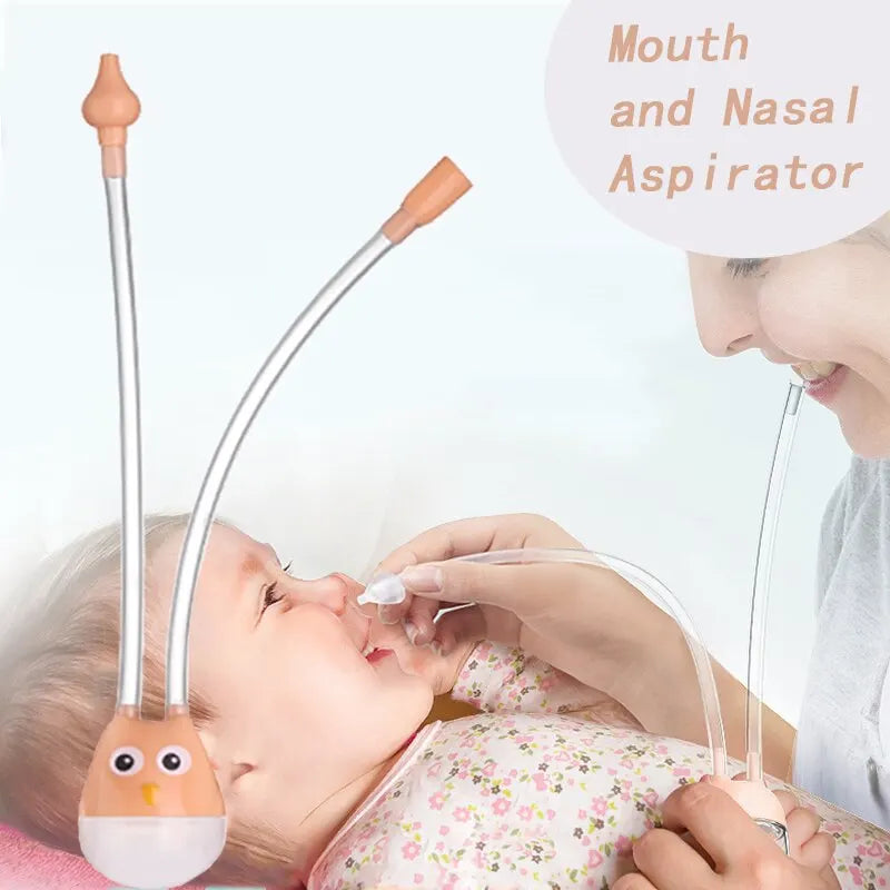 Baby being assisted with a mouth and nasal aspirator by an adult.