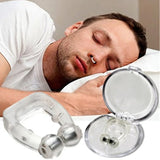 Man sleeping with a mouthguard and a vacuum-formed pillow on a white surface.
