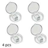 Four dental retainers in open clear cases on a white background