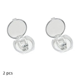 Two pairs of silver earrings in open cases on a white background
