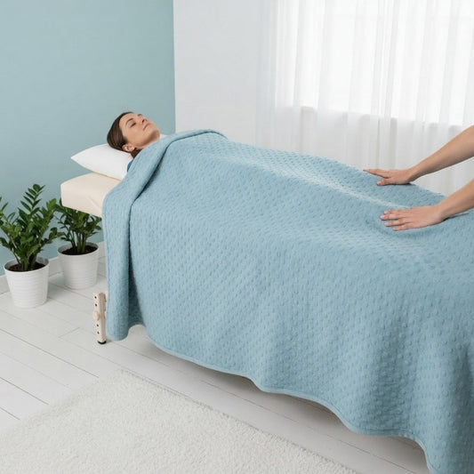 Weighted blanket deep pressure therapy session in a serene room