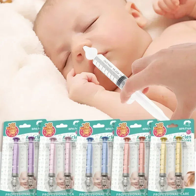 Baby receiving nasal irrigation with a syringe, with packages of nasal irrigation devices below.