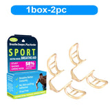 Gold nasal breathe aid devices with packaging on a white background