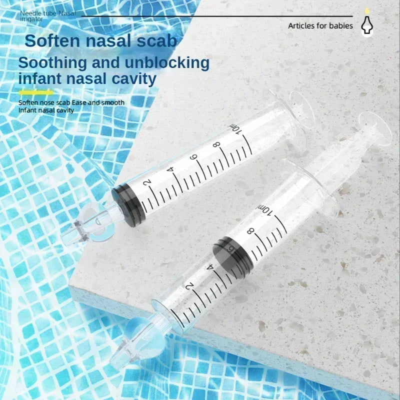 Two syringes on a textured surface with text about nasal care.