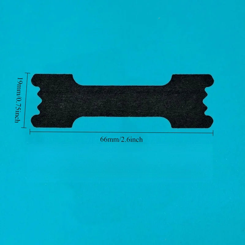 Black plastic component with measurements on a blue background