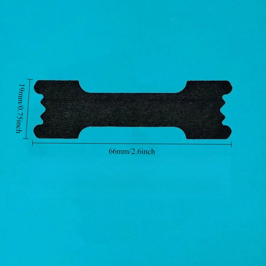 Black plastic component with measurements on a blue background