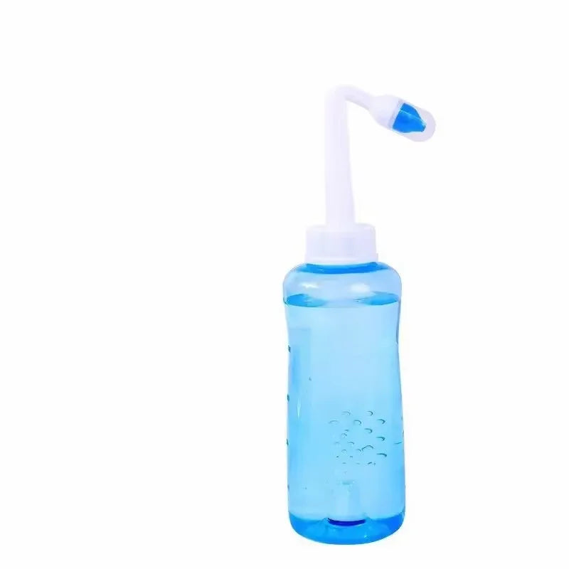 Blue nasal irrigation device on a white background