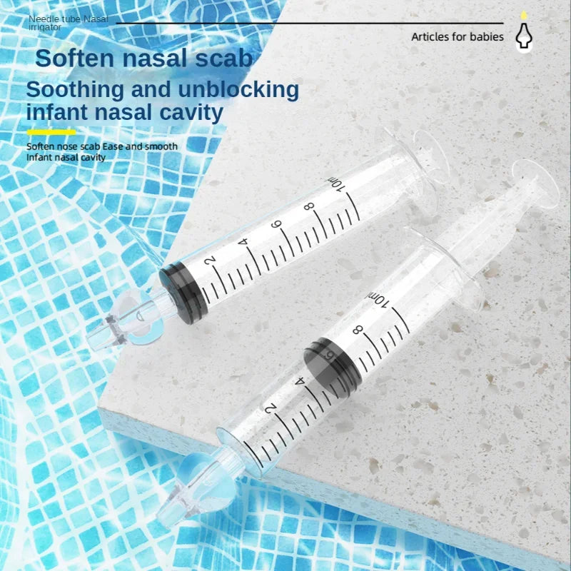 Two syringes on a textured surface with text about nasal care.