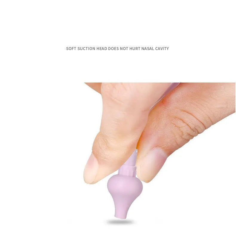 Purple nasal suction device held between fingers on a white background