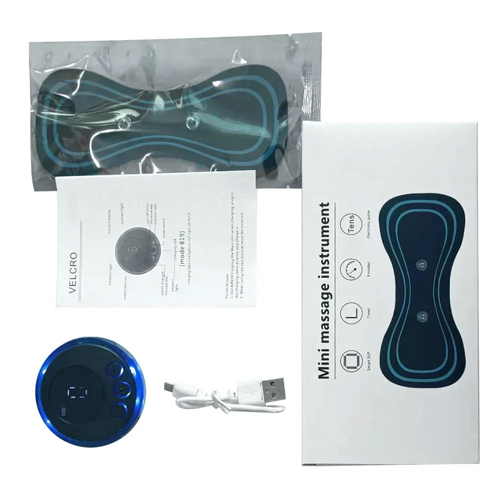 Mini massage instrument with packaging, USB cable, and user manual on a white background